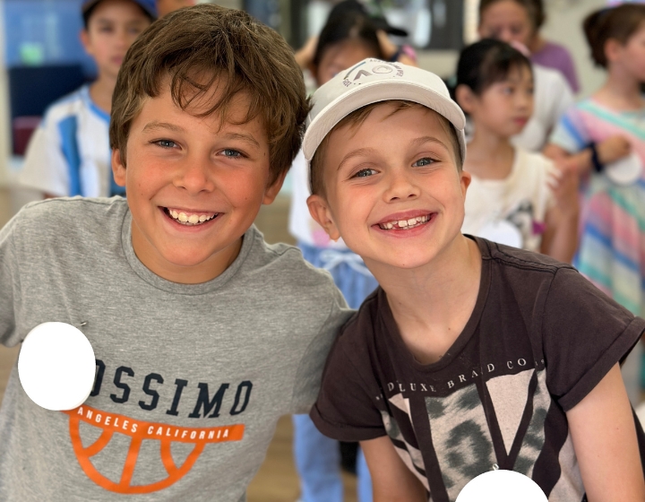 Boys smile at an ISPA Holiday Camp